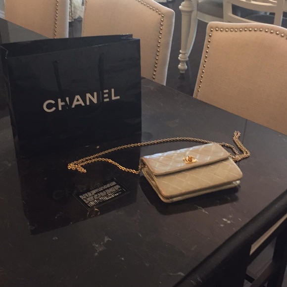 CHANEL Handbags - Chanel small gold leather quilted bag